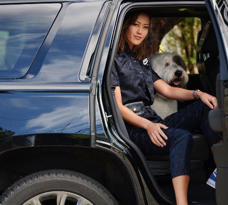 She is wearing a black dress.